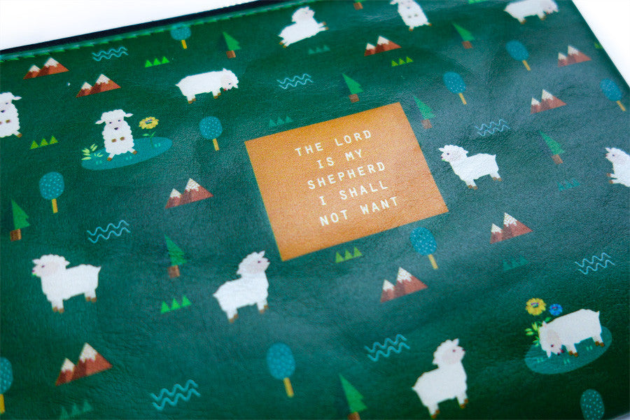 Close up of sheeps, trees, mountains design