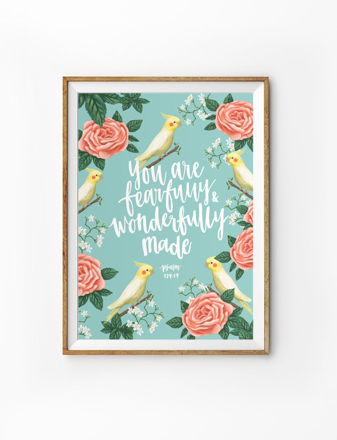 Poster featuring typography bible verses with flowers and birds designs ‘You are fearfully and wonderfully made’. is hung on the wall in a gold photo frame. 200GSM paper, available in A3,A4 size. Great home decor ideas