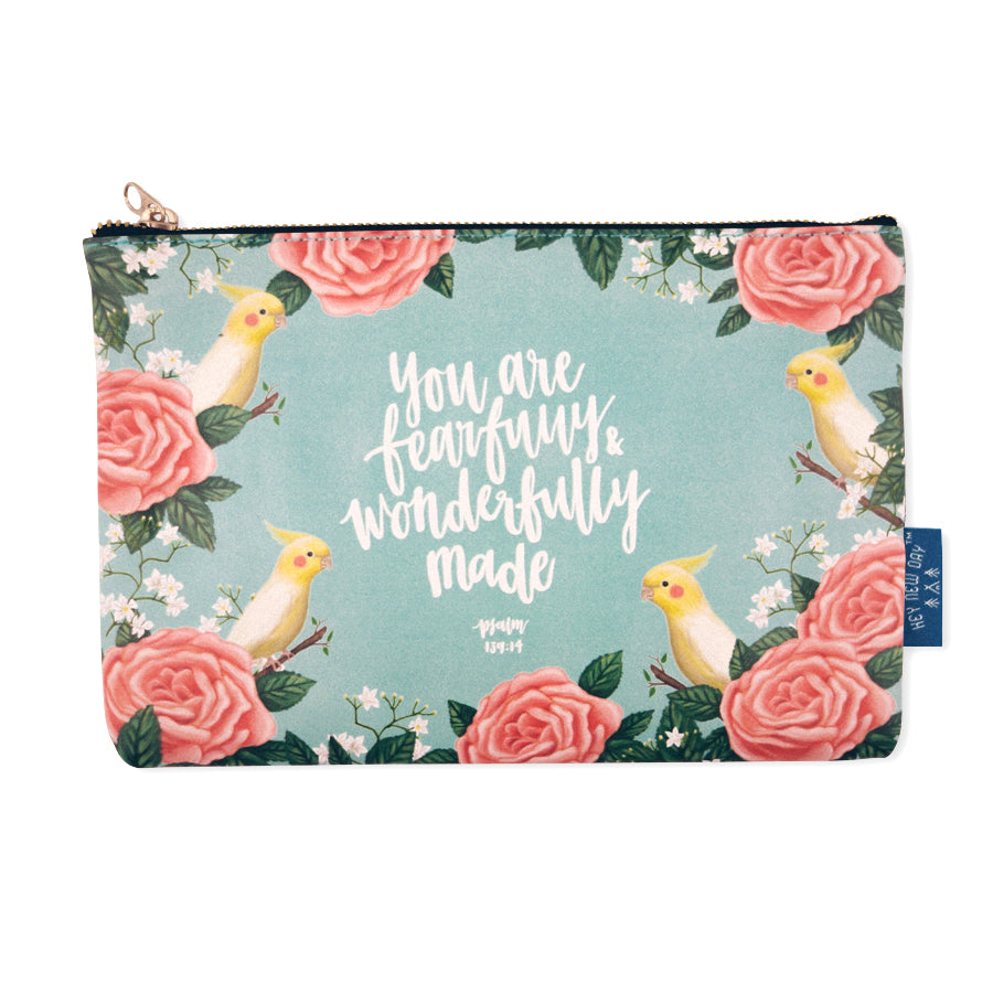 Multipurpose PU Leather pouch in teal with yellow birds designs on it. Features bible verse ‘You are fearfully and wonderfully made’ in white lettering and is great Christian gift idea. The pouch has inner lining, gold zip. Dimensions: 21cm (W) x 14cm (H)